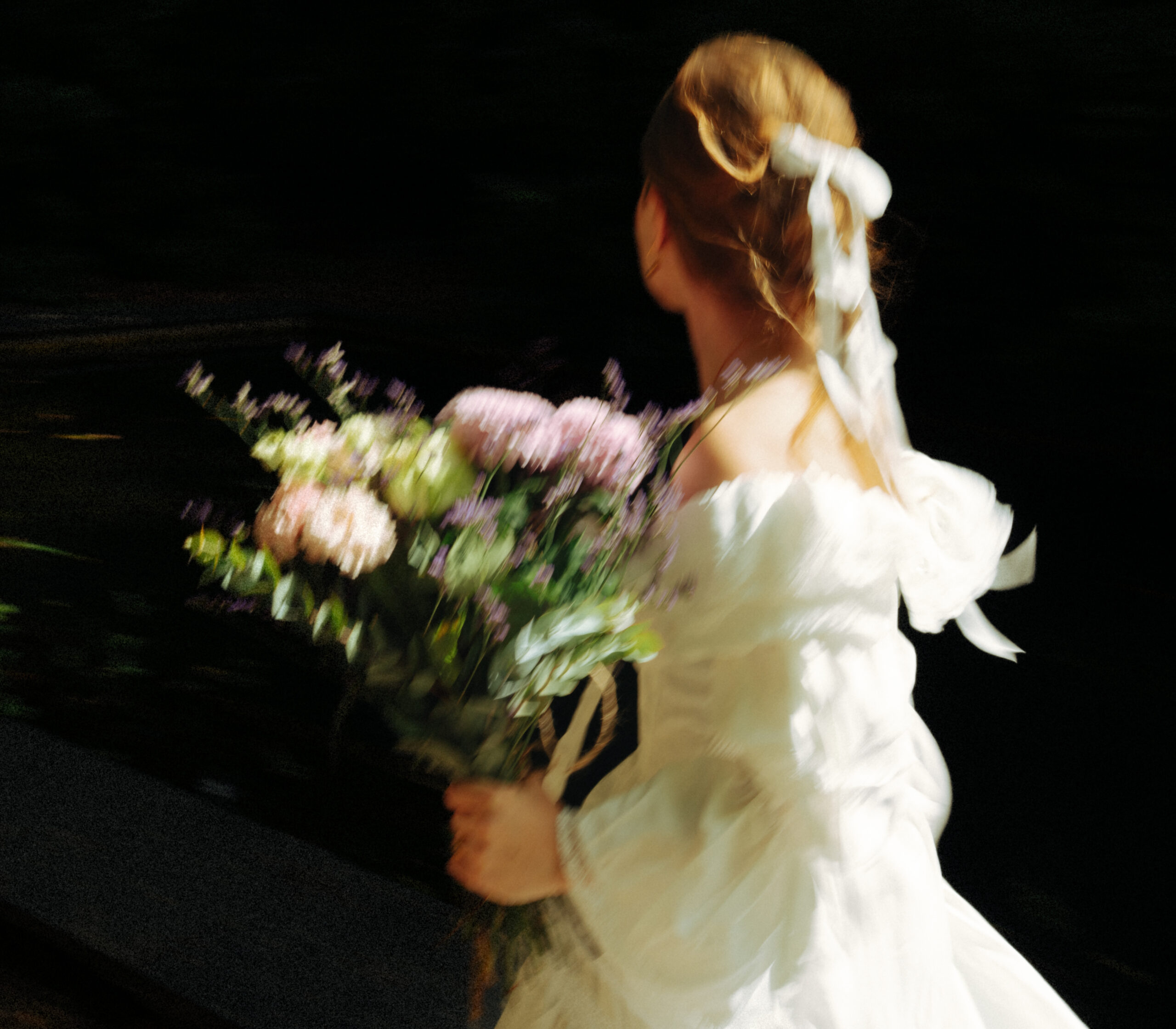 A cinematic photo of the bride taken during an elopement in Belgium.