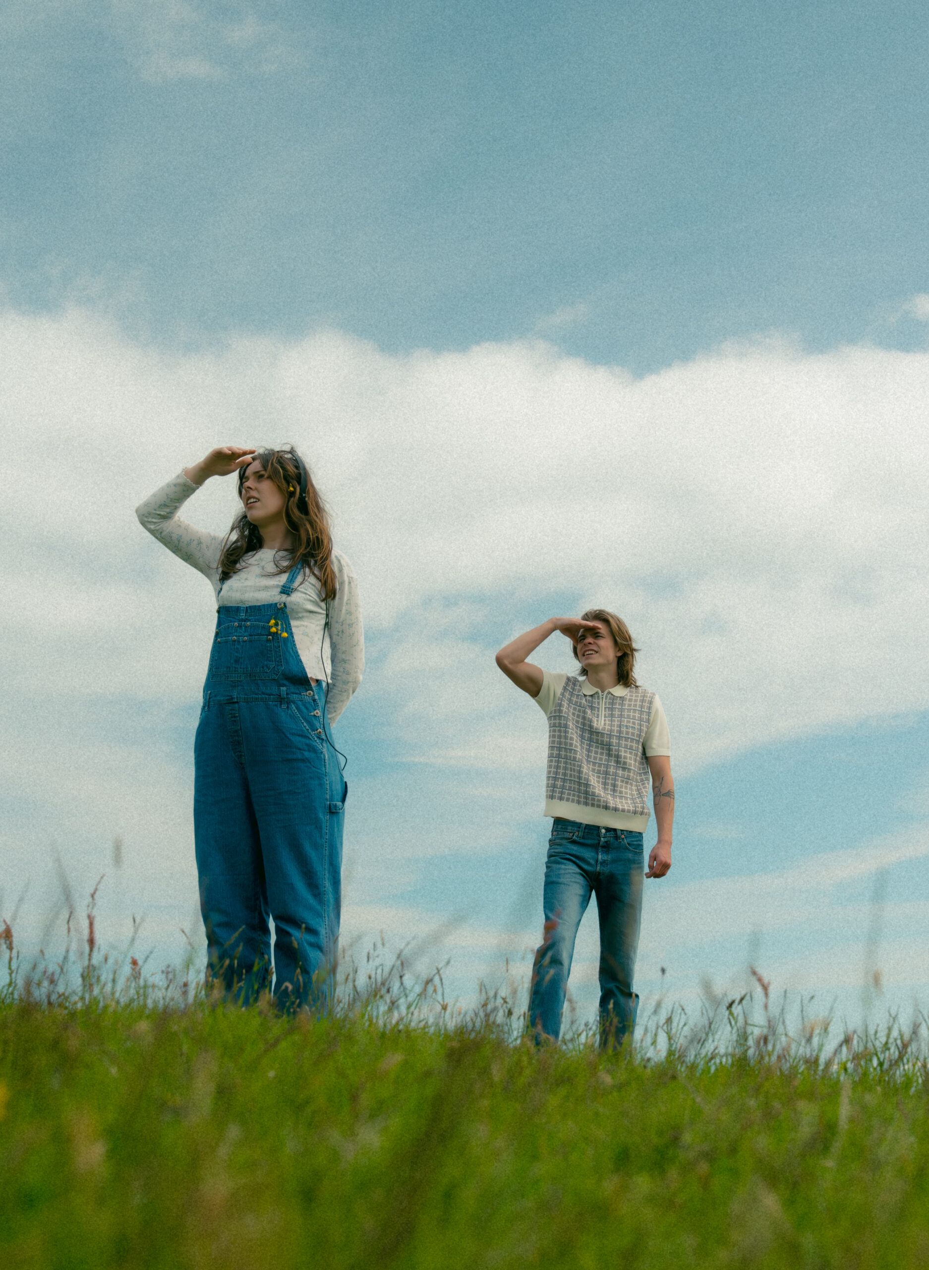 A cinematic photo of a couple posing in Vik, Iceland.