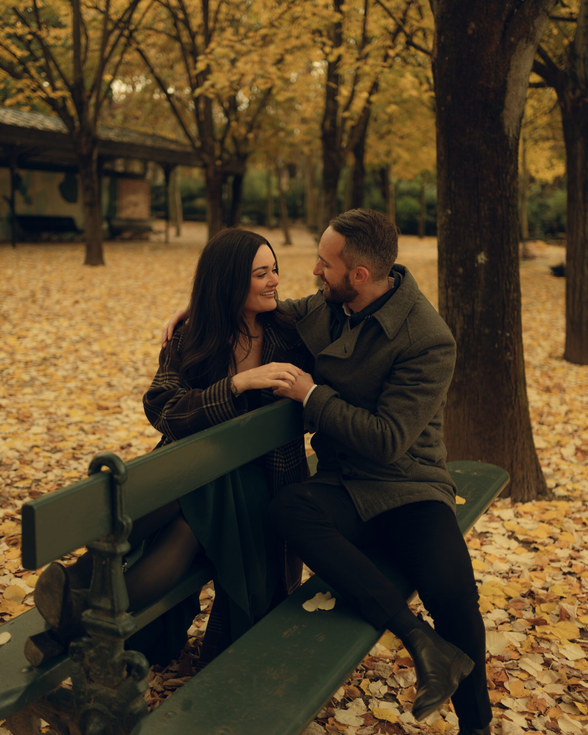 A cinematic portrait of a couple in Jardin du Luxembourg in Paris.