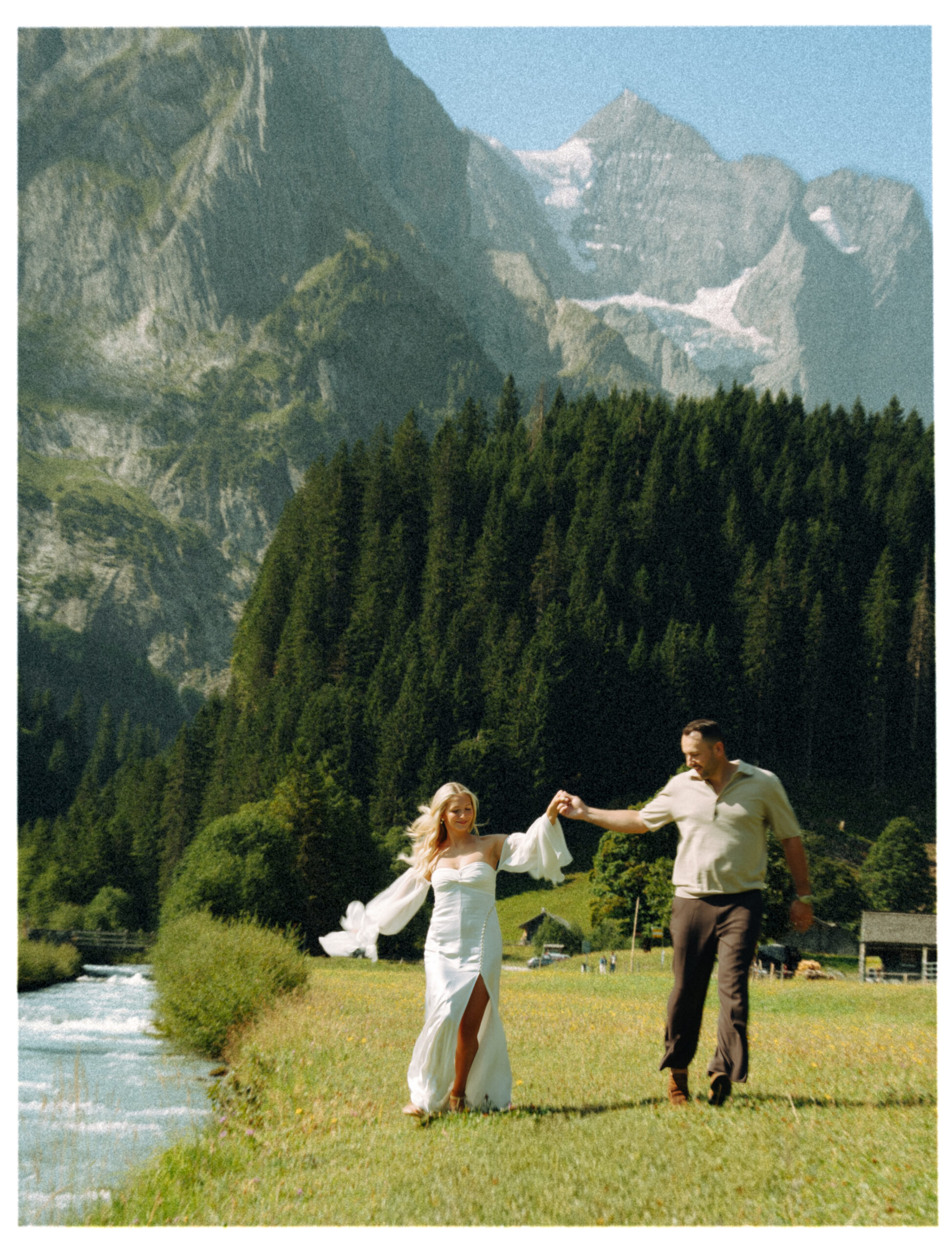 A cinematic photo of a couple taken during their mountain bridal adventure in Rosenlaui, Switzerland.