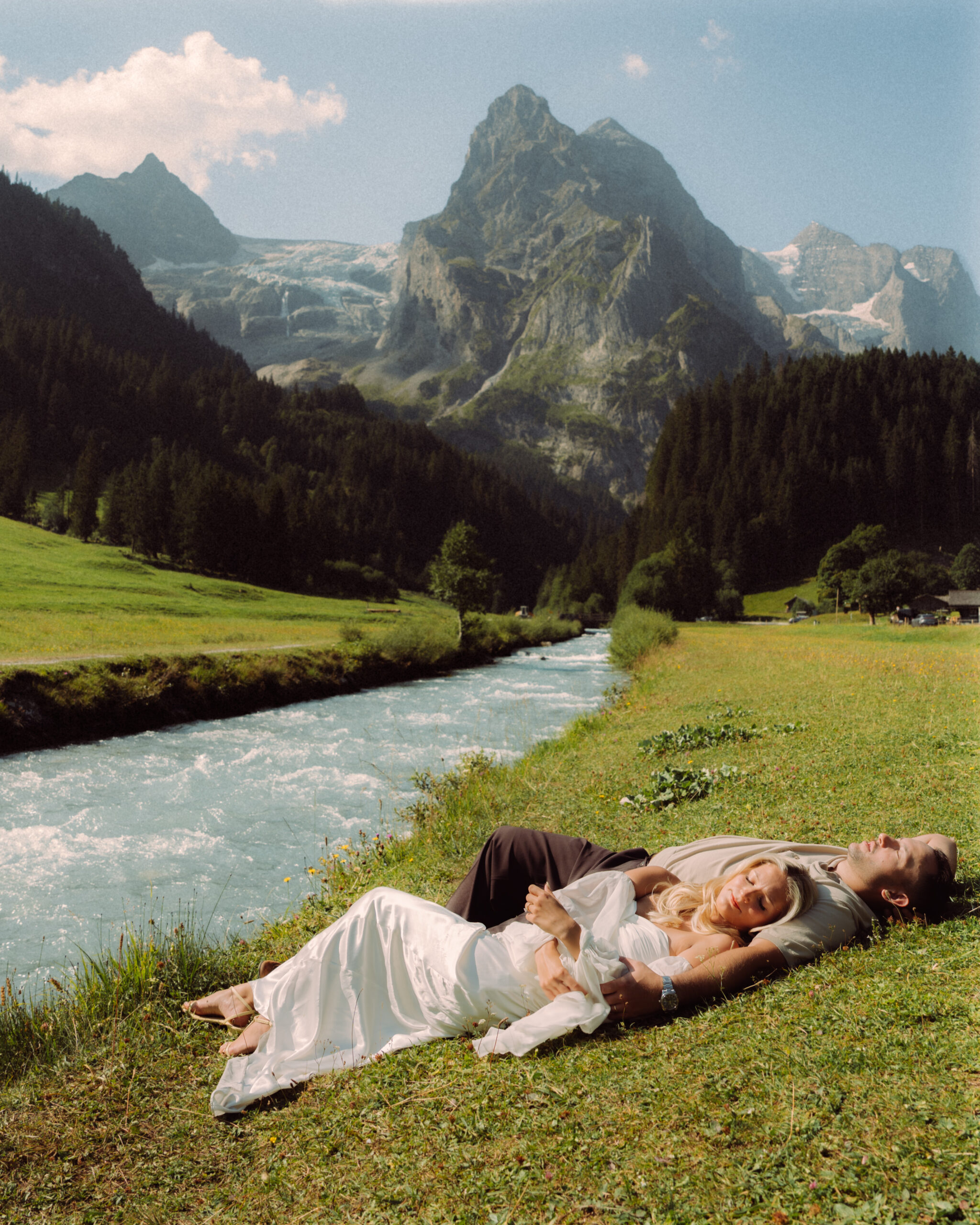 A cinematic photo of a couple taken during their mountain bridal photo shoot in Rosenlaui, Switzerland.