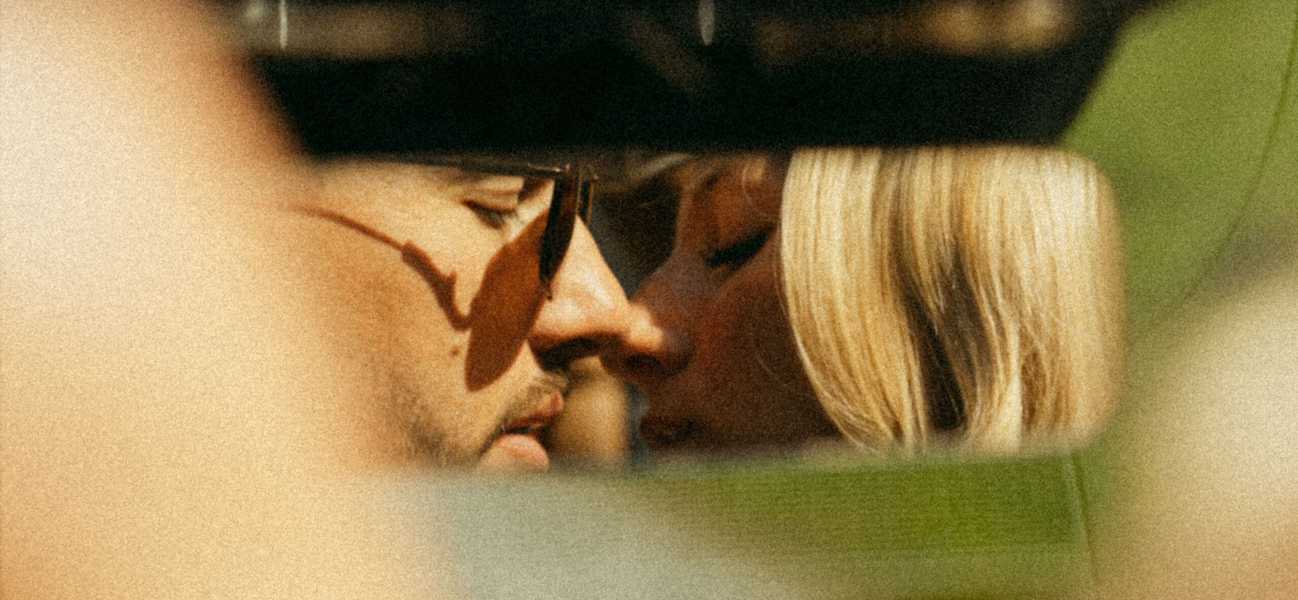A cinematic photo of a couple taken during their mountain bridal adventure in Switzerland.