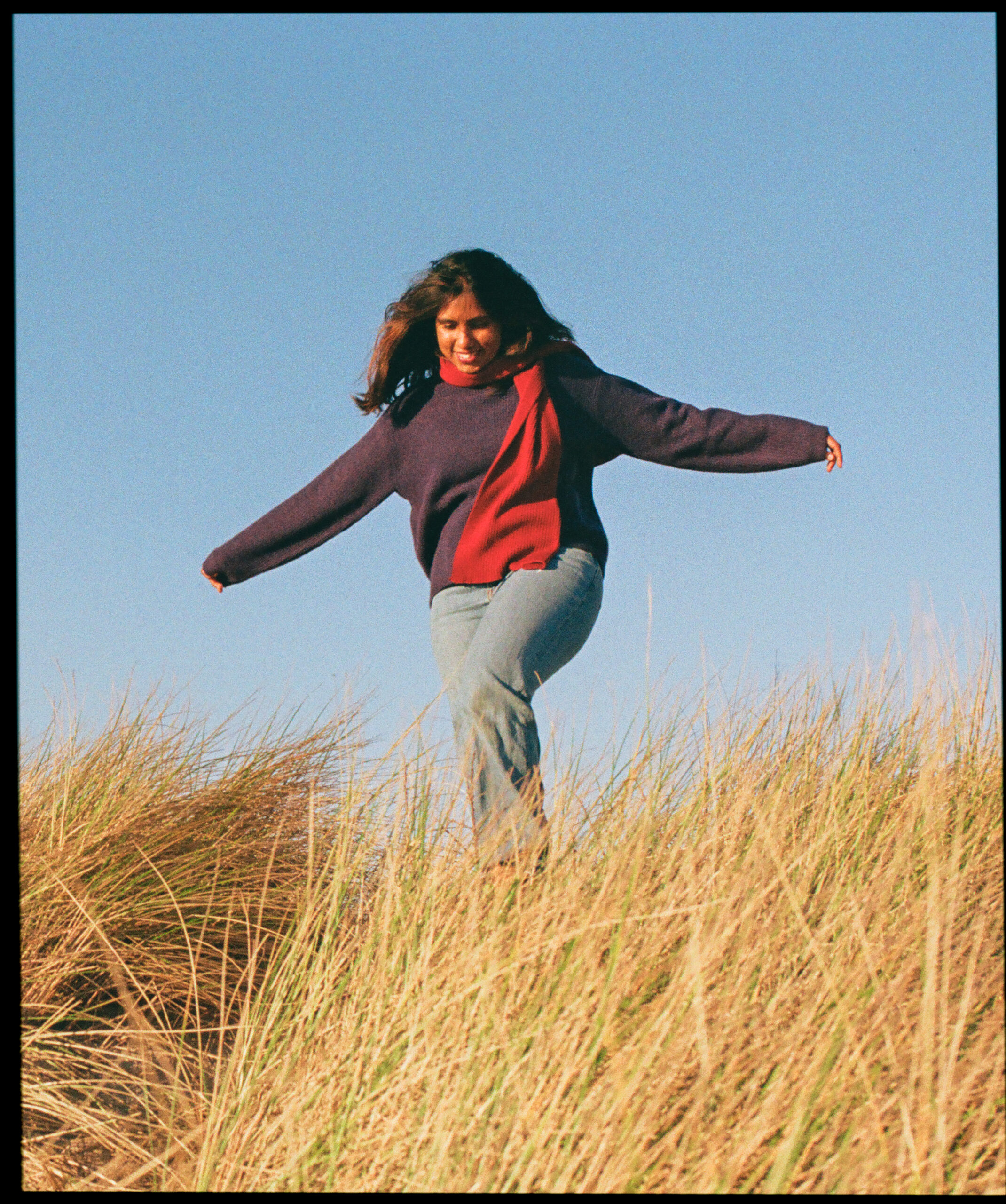 Kiki from Grainy Soul Photos at a beach in the Netherlands.