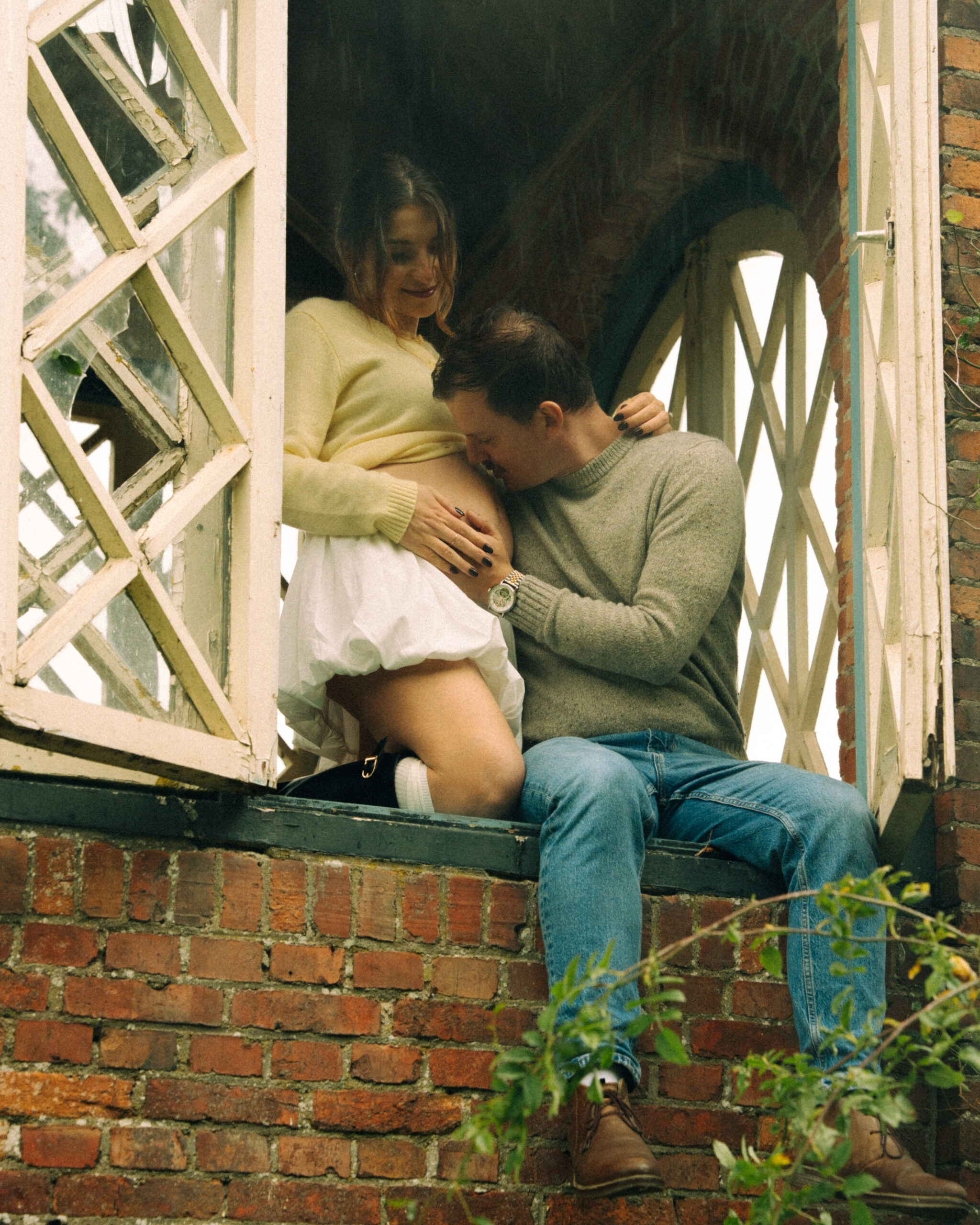 A cinematic photo of a couple at an apple orchard in the Netherlands.