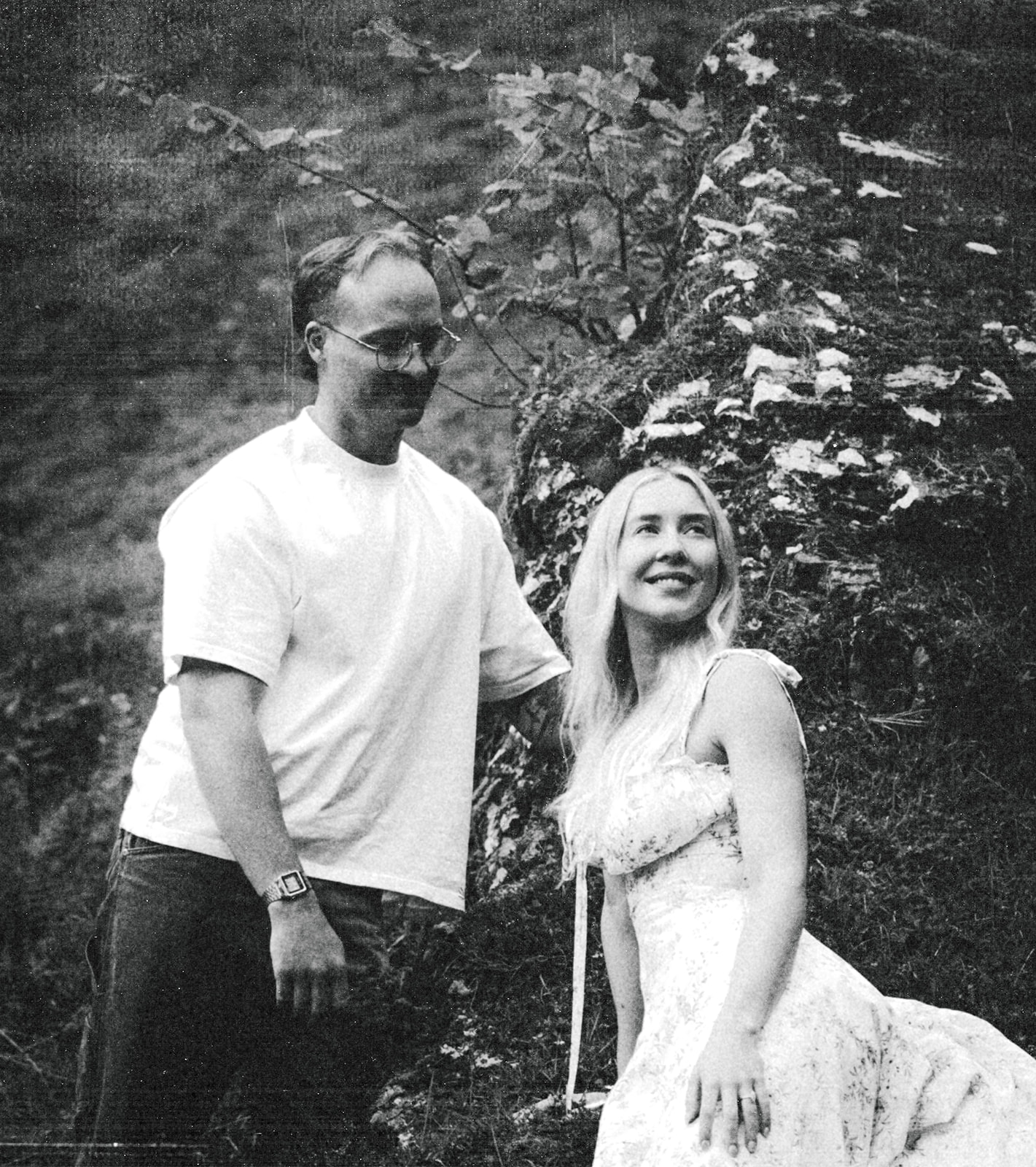 A cinematic photo of a couple posing near Wengen, Switzerland.