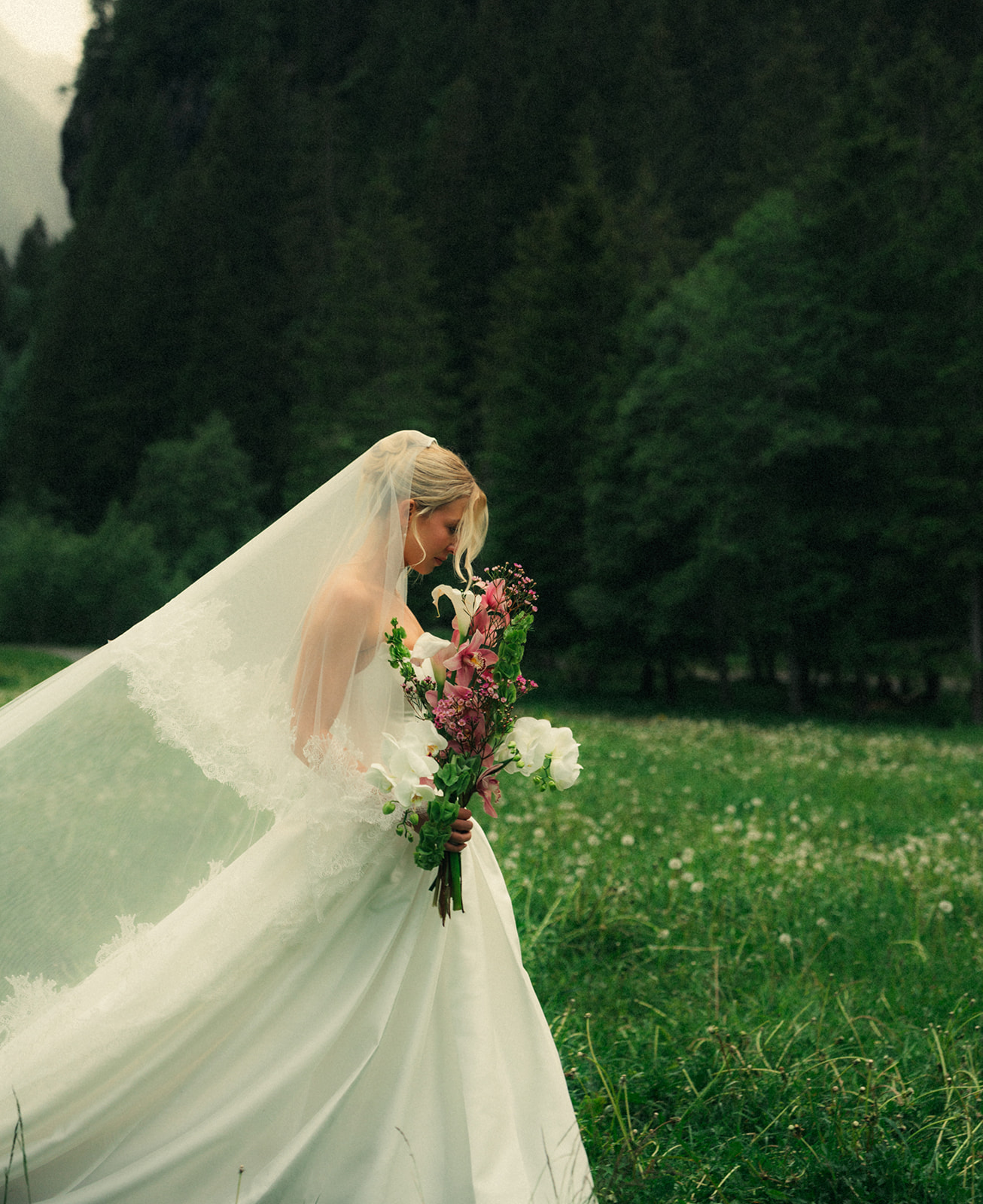 A cinematic photo of a bride during her elopement in Rosenlaui, Switzerland.