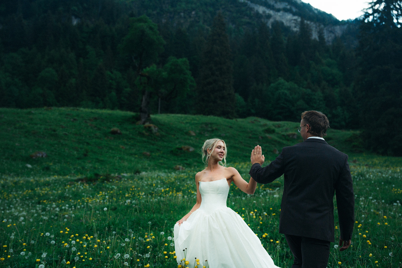 A cinematic photo of a bride and bridegroom during their elopement in Rosenlaui, Switzerland.