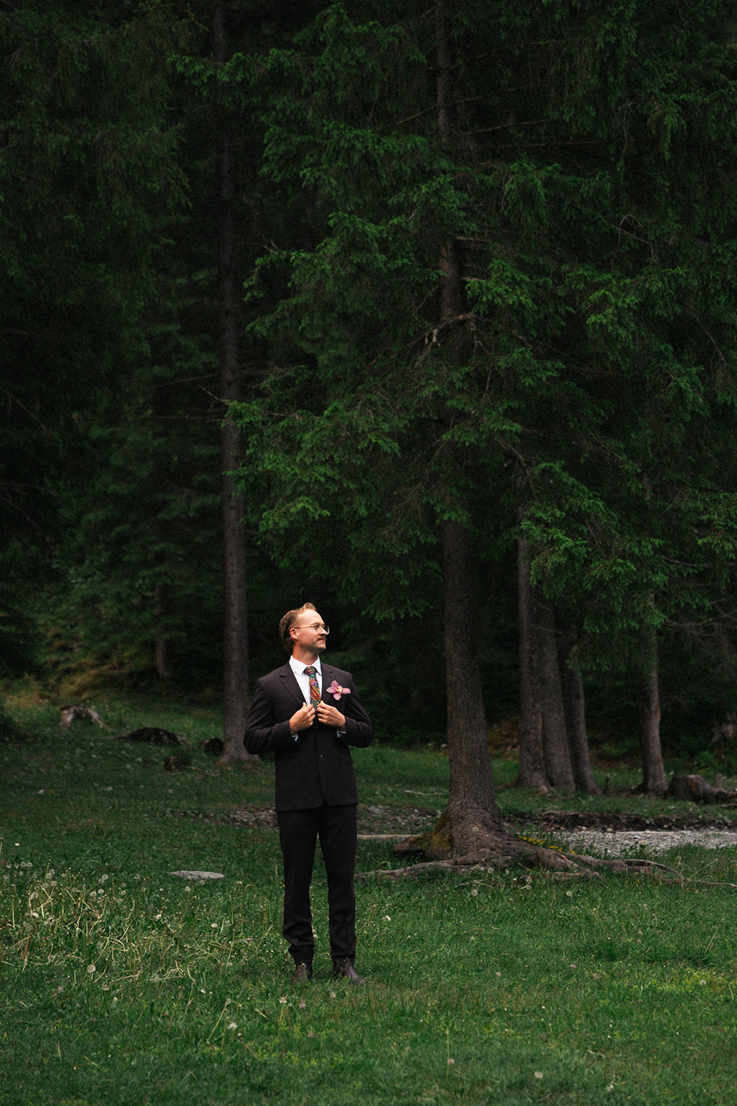A cinematic photo of a bridegroom during his elopement in Rosenlaui, Switzerland.