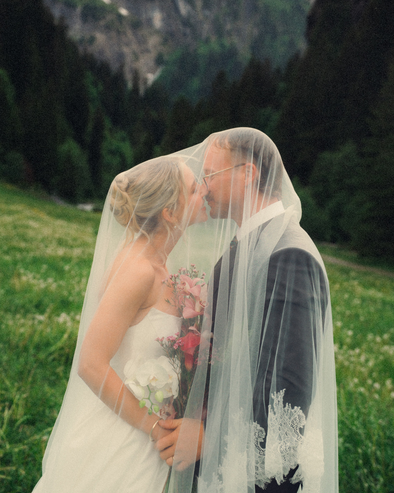 A cinematic photo of a bride and bridegroom during their elopement in Rosenlaui, Switzerland.